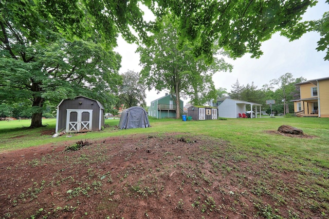 120 Knowles Ave, Southington, CT 06479 - view of green lawn featuring a shed