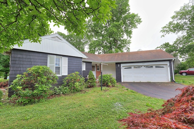 120 Knowles Ave, Southington, CT 06479 - ranch-style house with an attached garage, driveway, and a front lawn