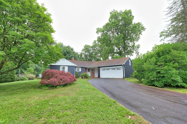 120 Knowles Ave, Southington, CT 06479 - ranch-style home featuring an attached garage, asphalt driveway, a chimney, and a front yard