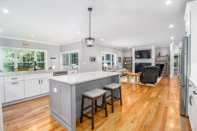 11 Tall Oaks Dr Unit 11, New Milford, CT 06776 - kitchen featuring a kitchen island, healthy amount of natural light, stainless steel appliances, light countertops, and recessed lighting