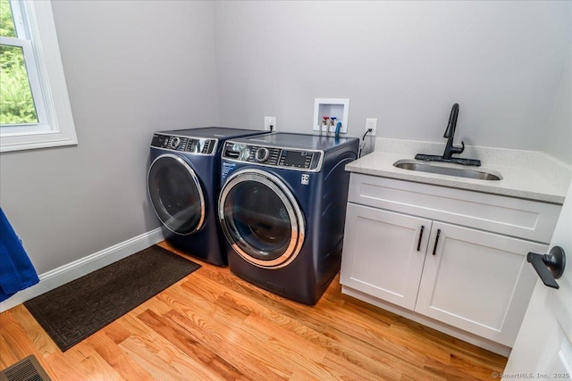 11 Tall Oaks Dr Unit 11, New Milford, CT 06776 - laundry room featuring washer and clothes dryer, cabinet space, and light wood finished floors