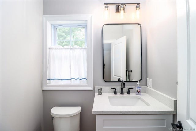 11 Tall Oaks Dr Unit 11, New Milford, CT 06776 - half bathroom featuring toilet and vanity