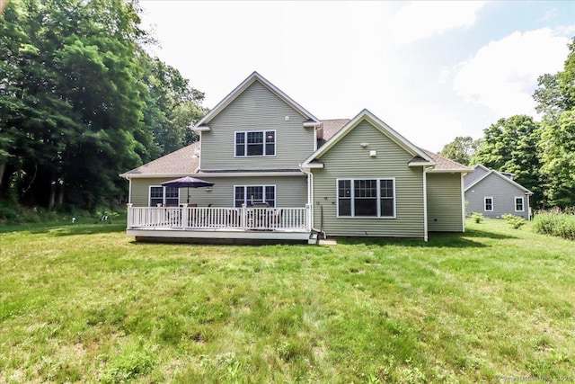 11 Tall Oaks Dr Unit 11, New Milford, CT 06776 - back of property with a deck and a lawn