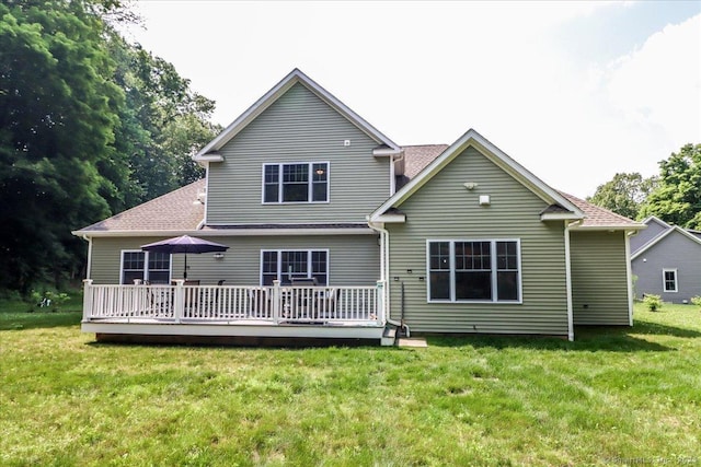 11 Tall Oaks Dr Unit 11, New Milford, CT 06776 - rear view of property featuring a wooden deck, a lawn, and a shingled roof