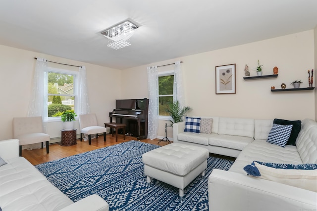 11 Park Ln, Trumbull, CT 06611 - living room featuring healthy amount of natural light, wood finished floors, and baseboard heating