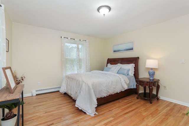 11 Park Ln, Trumbull, CT 06611 - bedroom featuring a baseboard radiator and light wood-type flooring