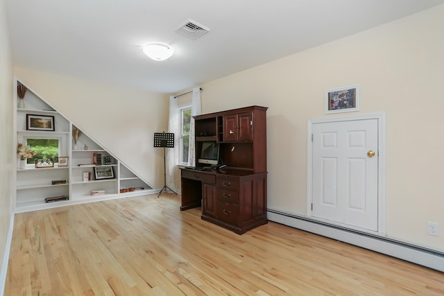 11 Park Ln, Trumbull, CT 06611 - unfurnished office with baseboard heating, light wood-style flooring, and built in features