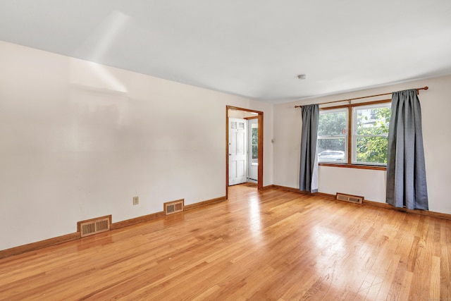 70 Sage Ave, Bridgeport, CT 06610 - unfurnished room featuring wood finished floors and baseboards