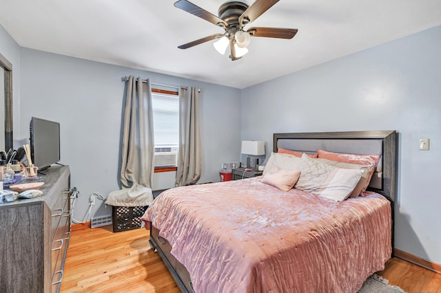 70 Sage Ave, Bridgeport, CT 06610 - bedroom with light wood-type flooring, ceiling fan, and cooling unit