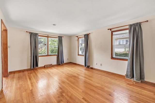 70 Sage Ave, Bridgeport, CT 06610 - spare room featuring light wood-type flooring and baseboards