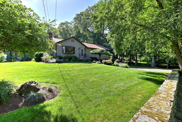 23 Fox Rd, Trumbull, CT 06611 - ranch-style home featuring a chimney and a front lawn