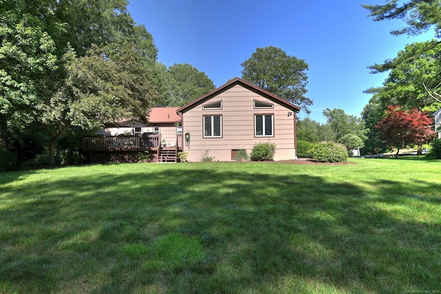 23 Fox Rd, Trumbull, CT 06611 - rear view of house featuring a deck and a yard