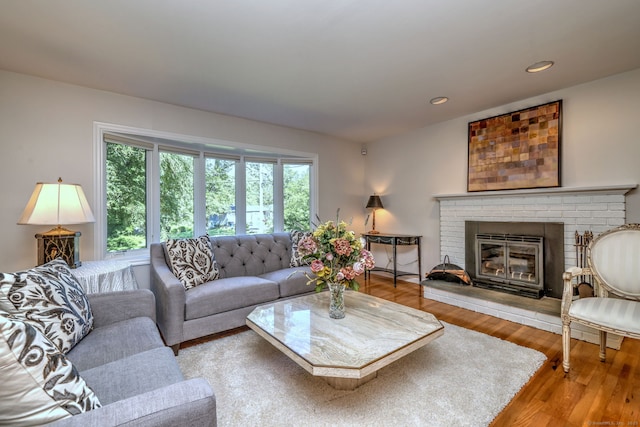 23 Fox Rd, Trumbull, CT 06611 - living room featuring plenty of natural light, wood finished floors, a fireplace, and recessed lighting
