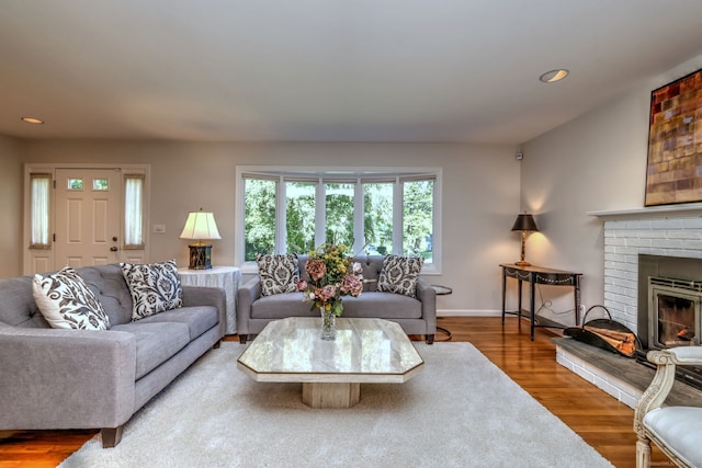 23 Fox Rd, Trumbull, CT 06611 - living room with recessed lighting, wood finished floors, and a brick fireplace