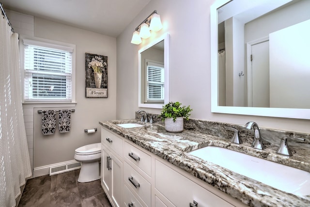 23 Fox Rd, Trumbull, CT 06611 - bathroom featuring double vanity and toilet