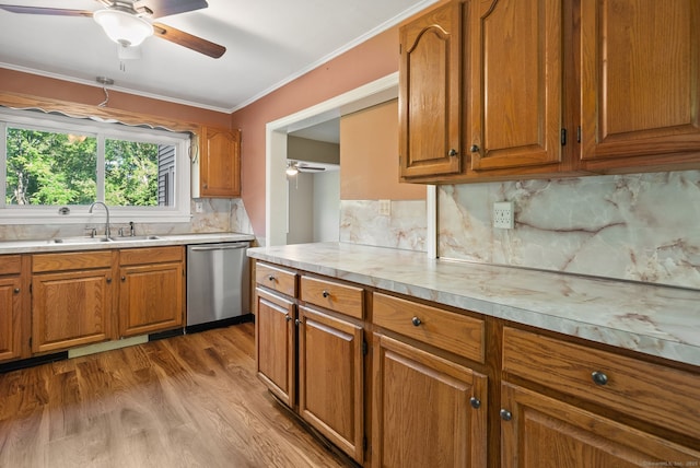 20 Mack Rd, Middlefield, CT 06455 - kitchen with dishwasher, a ceiling fan, light countertops, brown cabinetry, and wood finished floors