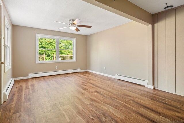20 Mack Rd, Middlefield, CT 06455 - empty room with baseboard heating, ceiling fan, and wood finished floors