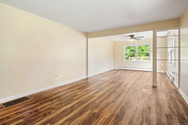 20 Mack Rd, Middlefield, CT 06455 - unfurnished room featuring a baseboard radiator, a ceiling fan, and wood finished floors