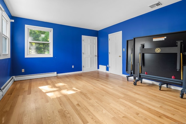 20 Mack Rd, Middlefield, CT 06455 - unfurnished bedroom featuring a baseboard radiator and wood finished floors