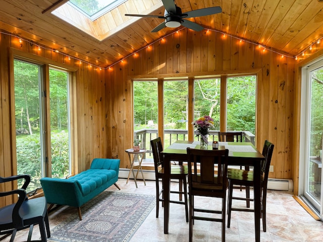 60 Olsen Dr, Mansfield, CT 06250 - dining area featuring vaulted ceiling, plenty of natural light, a skylight, wooden walls, and wood ceiling