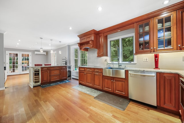 9 Allen Ct, Norwalk, CT 06851 - kitchen featuring stainless steel dishwasher, beverage cooler, a wall unit AC, recessed lighting, and light wood-type flooring