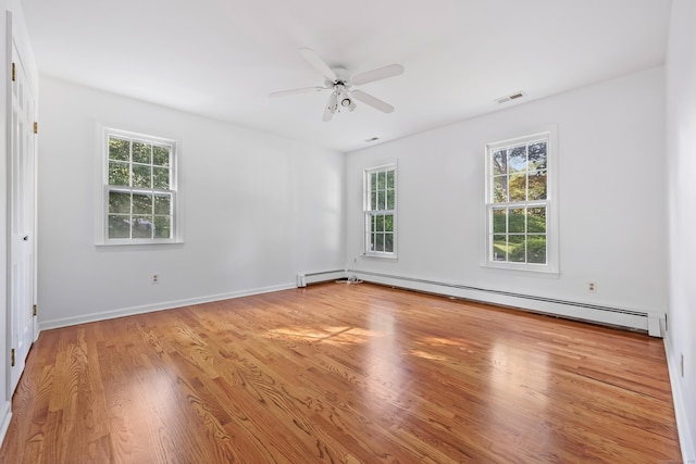 9 Allen Ct, Norwalk, CT 06851 - spare room with a baseboard heating unit, wood finished floors, and ceiling fan