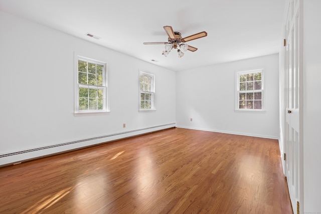 9 Allen Ct, Norwalk, CT 06851 - spare room with a baseboard radiator, wood finished floors, and ceiling fan