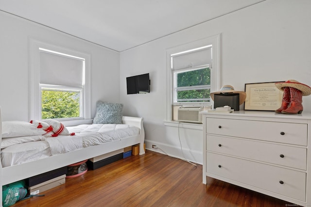 14 Highview Ave, Greenwich, CT 06870 - bedroom with multiple windows, cooling unit, and dark wood-style floors