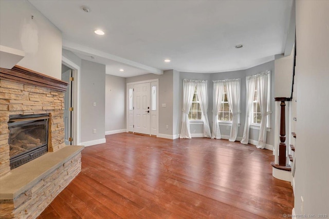 185 Chimney Hill Rd, Wallingford, CT 06492 - unfurnished living room with wood finished floors, recessed lighting, and a fireplace