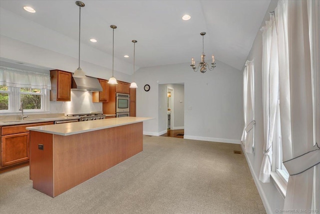 185 Chimney Hill Rd, Wallingford, CT 06492 - kitchen featuring wall chimney exhaust hood, light countertops, brown cabinets, a center island, and vaulted ceiling