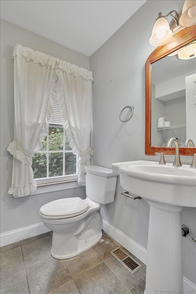 185 Chimney Hill Rd, Wallingford, CT 06492 - half bathroom featuring toilet and baseboards