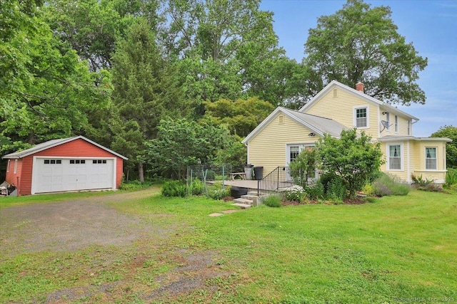 185 Chimney Hill Rd, Wallingford, CT 06492 - view of green lawn with an outbuilding and a detached garage