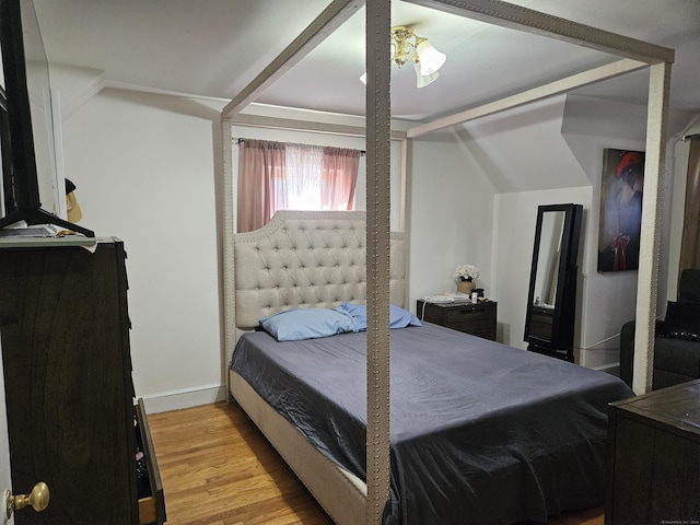 805 Savin Ave, West Haven, CT 06516 - bedroom with wood finished floors and vaulted ceiling