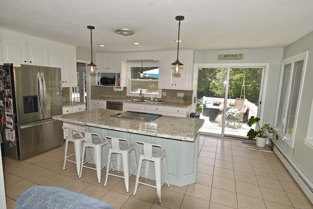 33 Oneil Rd, Oxford, CT 06478 - kitchen featuring appliances with stainless steel finishes, a baseboard heating unit, light tile patterned floors, white cabinets, and recessed lighting