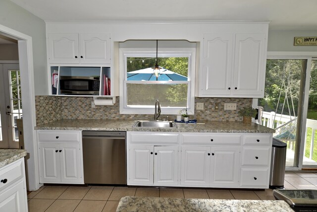 33 Oneil Rd, Oxford, CT 06478 - kitchen with appliances with stainless steel finishes, light tile patterned floors, and decorative backsplash