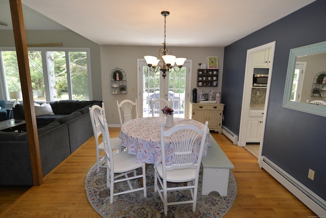33 Oneil Rd, Oxford, CT 06478 - dining room with a baseboard heating unit, a chandelier, and healthy amount of natural light