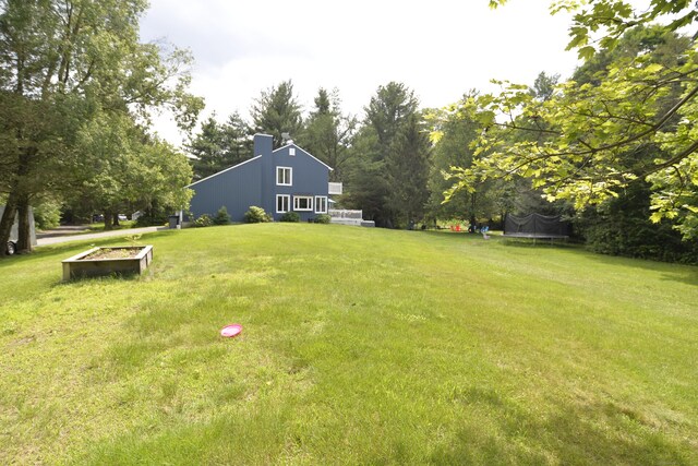 33 Oneil Rd, Oxford, CT 06478 - view of grassy yard with a trampoline