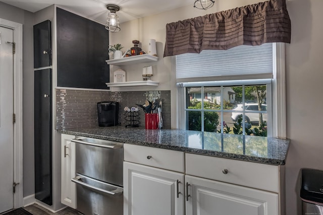 33 Thorpe St, North Haven, CT 06473 - kitchen featuring decorative backsplash, white cabinetry, open shelves, stainless steel dishwasher, and dark stone countertops