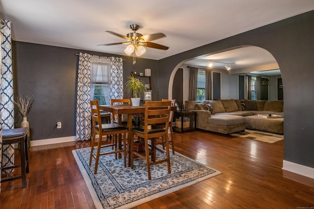33 Thorpe St, North Haven, CT 06473 - dining space with arched walkways, wood-type flooring, and ceiling fan