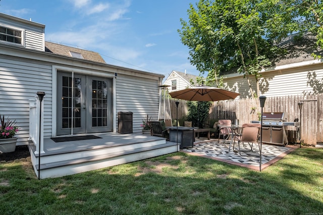 33 Thorpe St, North Haven, CT 06473 - view of yard featuring french doors, a deck, and a patio