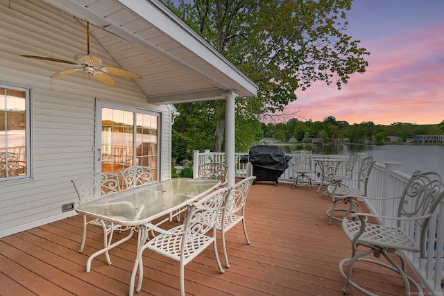 11 Bayside Dr, Wales, MA 01081 - deck with ceiling fan, a grill, outdoor dining space, and a water view