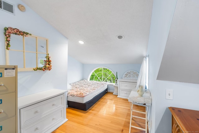 11 Bayside Dr, Wales, MA 01081 - bedroom with vaulted ceiling, recessed lighting, and light wood-style flooring