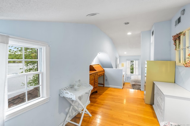 11 Bayside Dr, Wales, MA 01081 - corridor featuring light wood-style flooring, vaulted ceiling, and recessed lighting