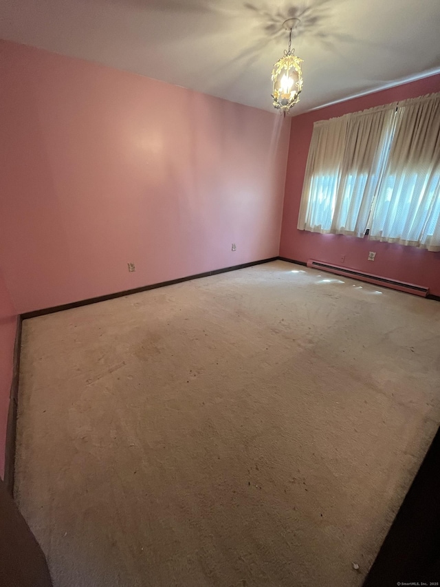 260 Capitol Ave, Waterbury, CT 06705 - spare room featuring a baseboard heating unit, a chandelier, and carpet flooring