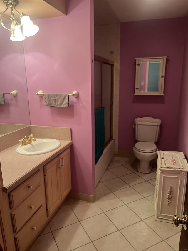 260 Capitol Ave, Waterbury, CT 06705 - bathroom featuring vanity, tile patterned floors, and enclosed tub / shower combo