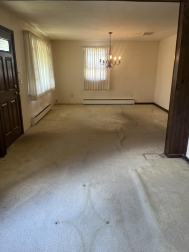 260 Capitol Ave, Waterbury, CT 06705 - unfurnished dining area featuring baseboard heating, carpet flooring, and a chandelier