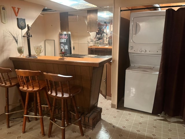 260 Capitol Ave, Waterbury, CT 06705 - indoor dry bar featuring stacked washer and clothes dryer