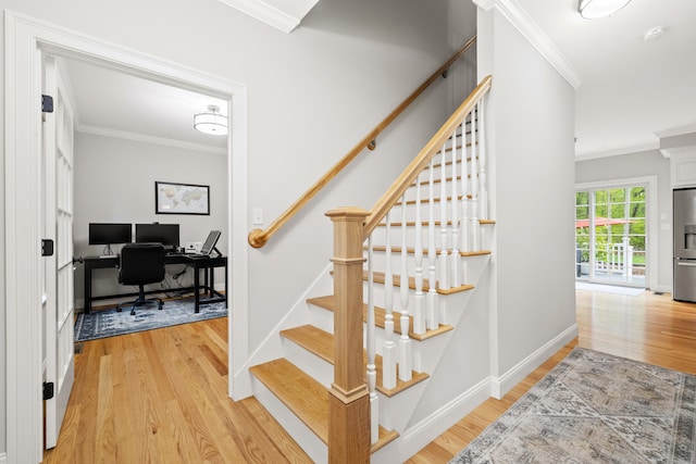 261 W St, Hebron, CT 06248 - stairs featuring wood finished floors and ornamental molding
