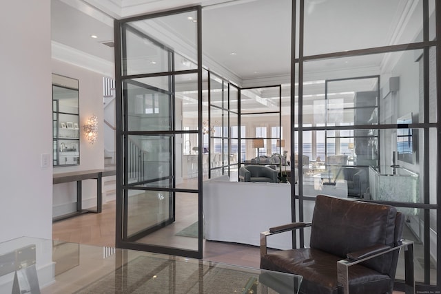 128 Mariners Way, Fairfield, CT 06824 - building lobby with crown molding and a wall of windows