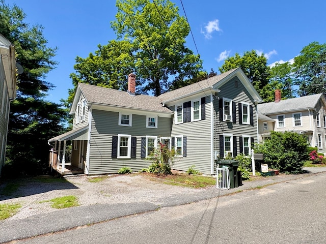 57 Prospect St, New Hartford, CT 06057 - colonial house featuring a chimney